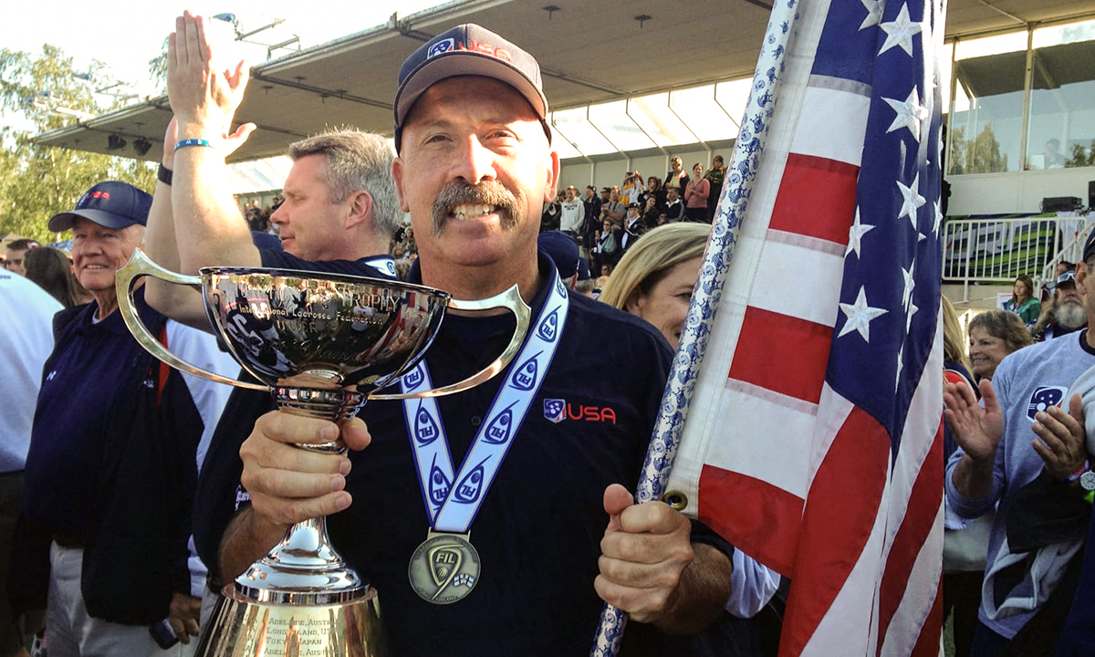 Tom Rotanz with trophy in had and a gold medal around his neck at the 2012 U19 world championship