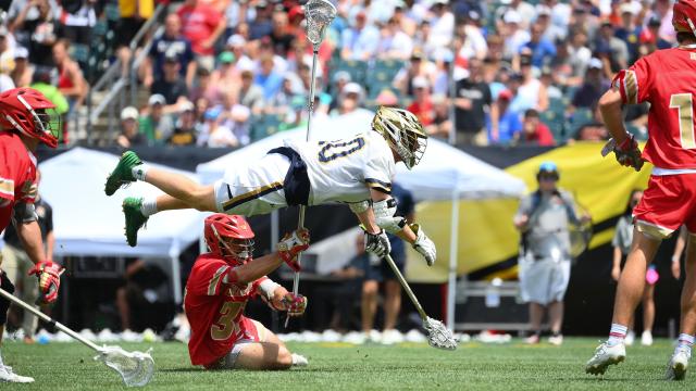 Chris Kavanagh flies through the air on a shot attempt.