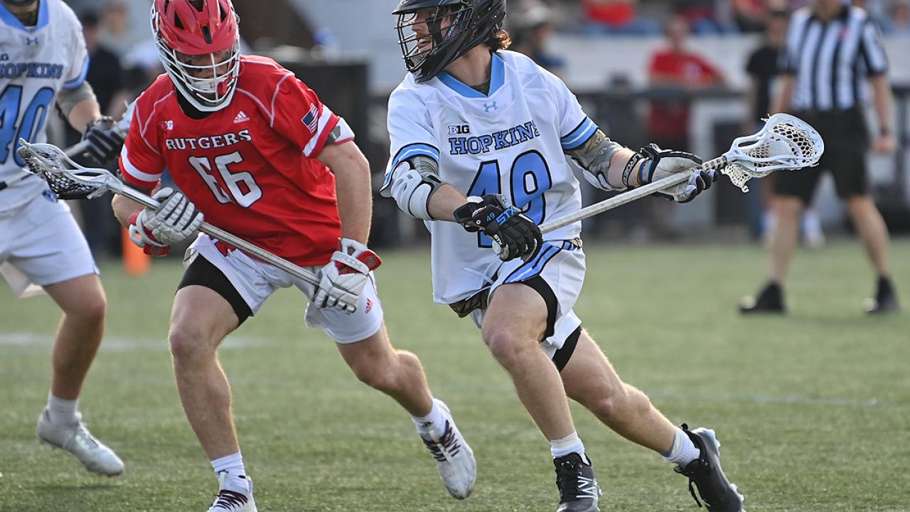 Ryan Evans scored two goals for the third time in the last four games as Johns Hopkins won its fifth straight game and improved to 2-0 in the Big Ten.