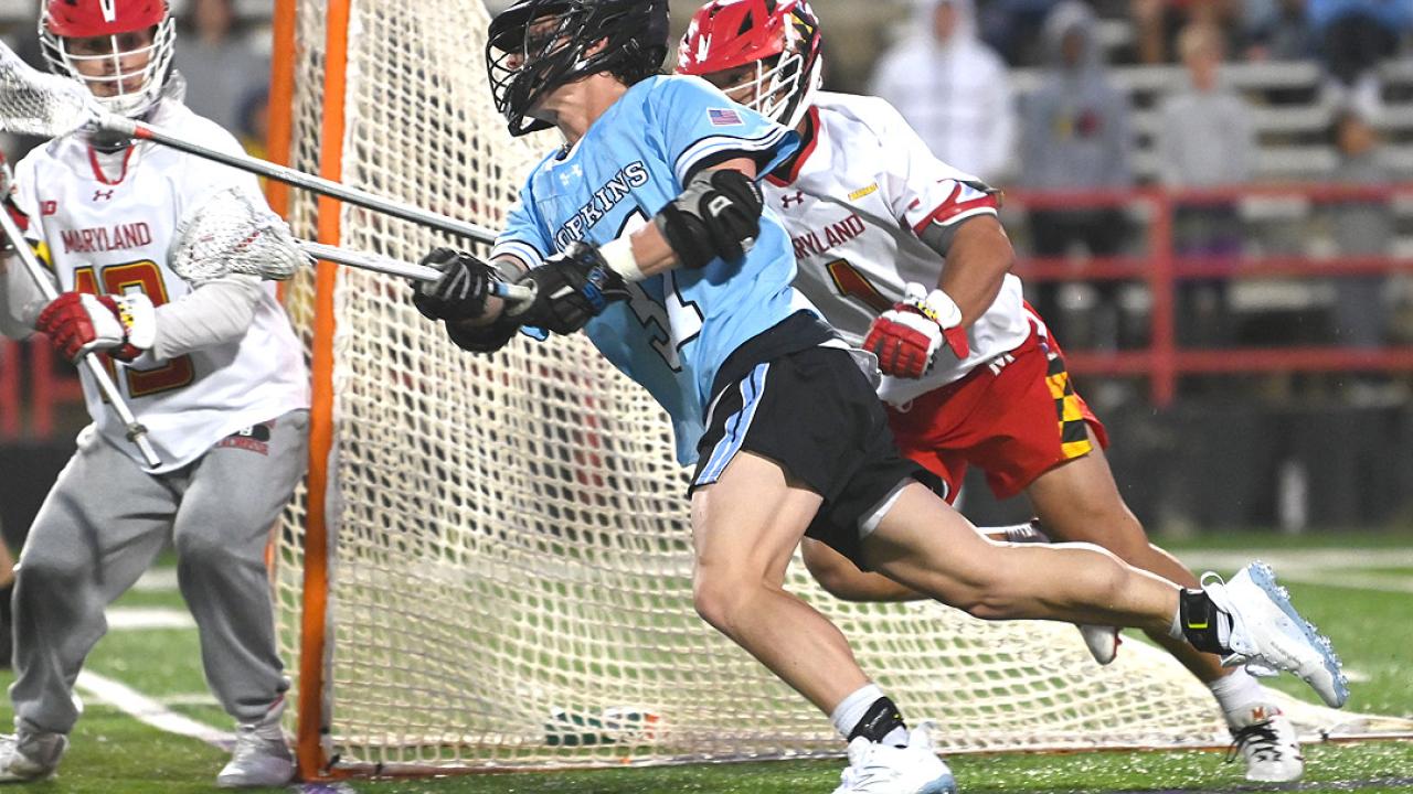 Johns Hopkins beat rival Maryland 12-11 on Saturday.