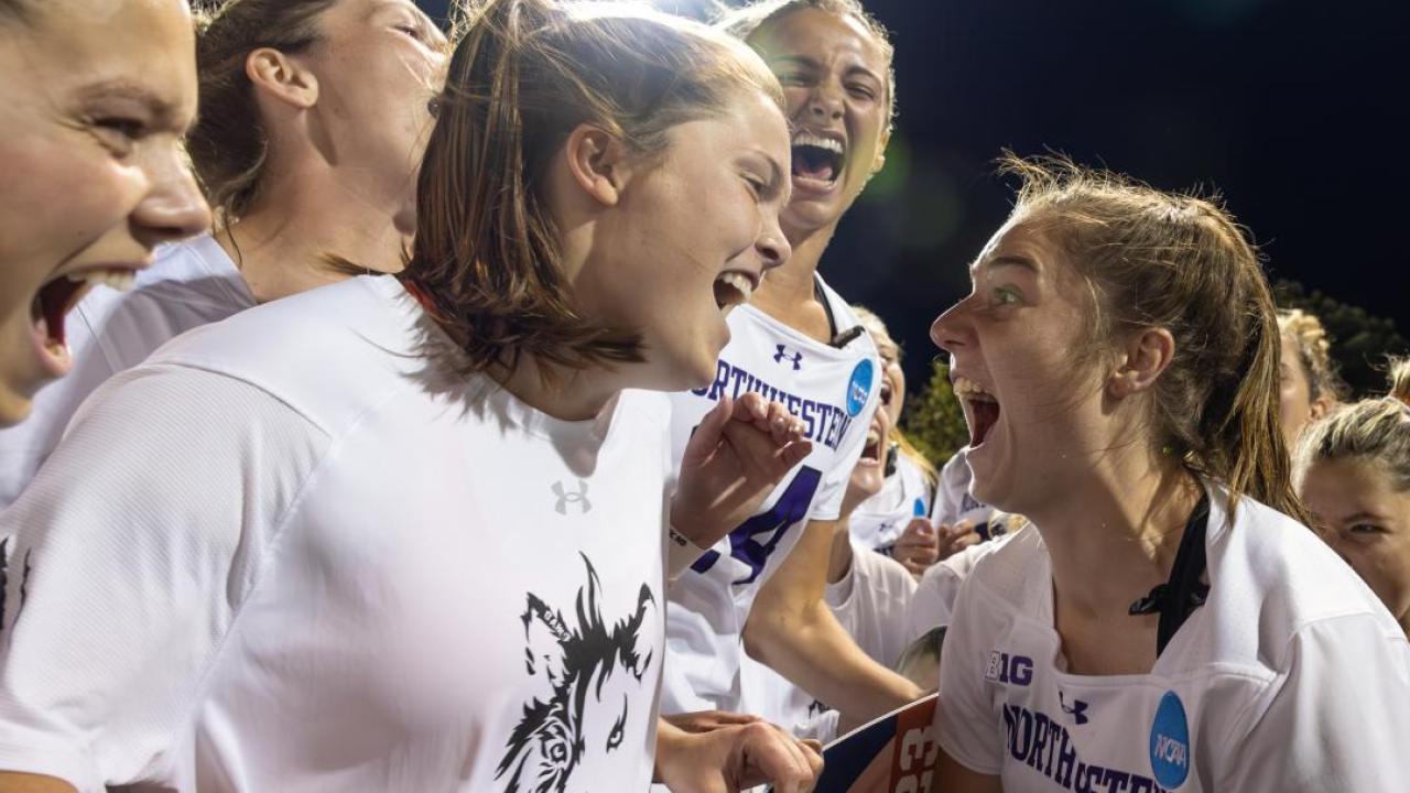 Erin Coykendall and Izzy Scane celebrate Northwestern's Big Ten championship.