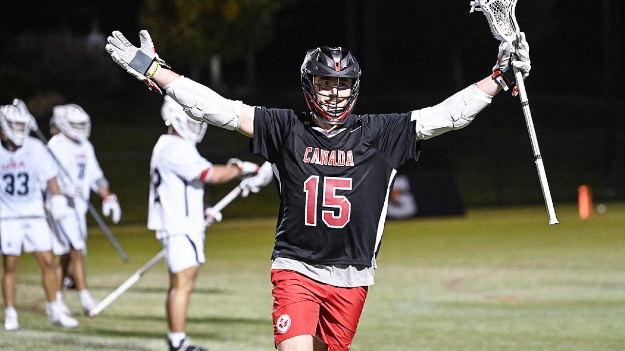 Dyson Williams gestures to the crowd at Tierney Field after scoring the game-winning goal in overtime.