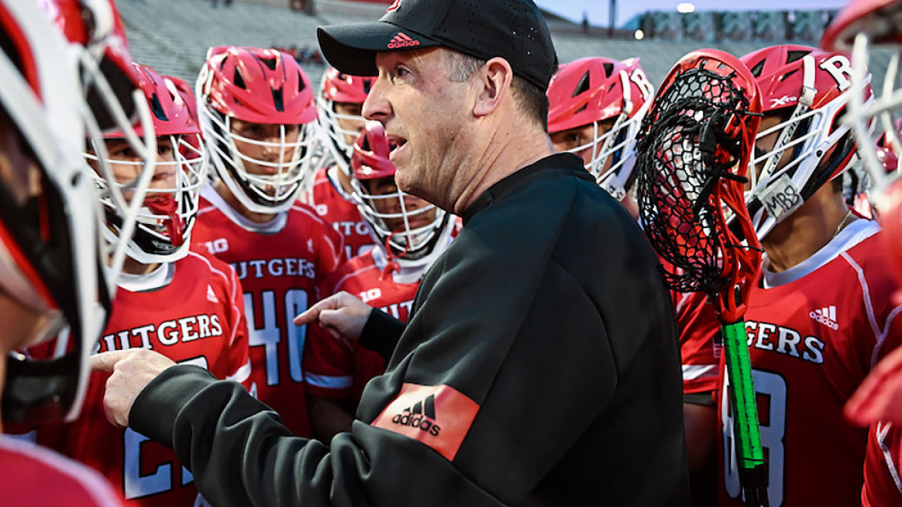 Rutgers coach Brian Brecht addresses the team before Saturday's Big Ten quarterfinal at Maryland.