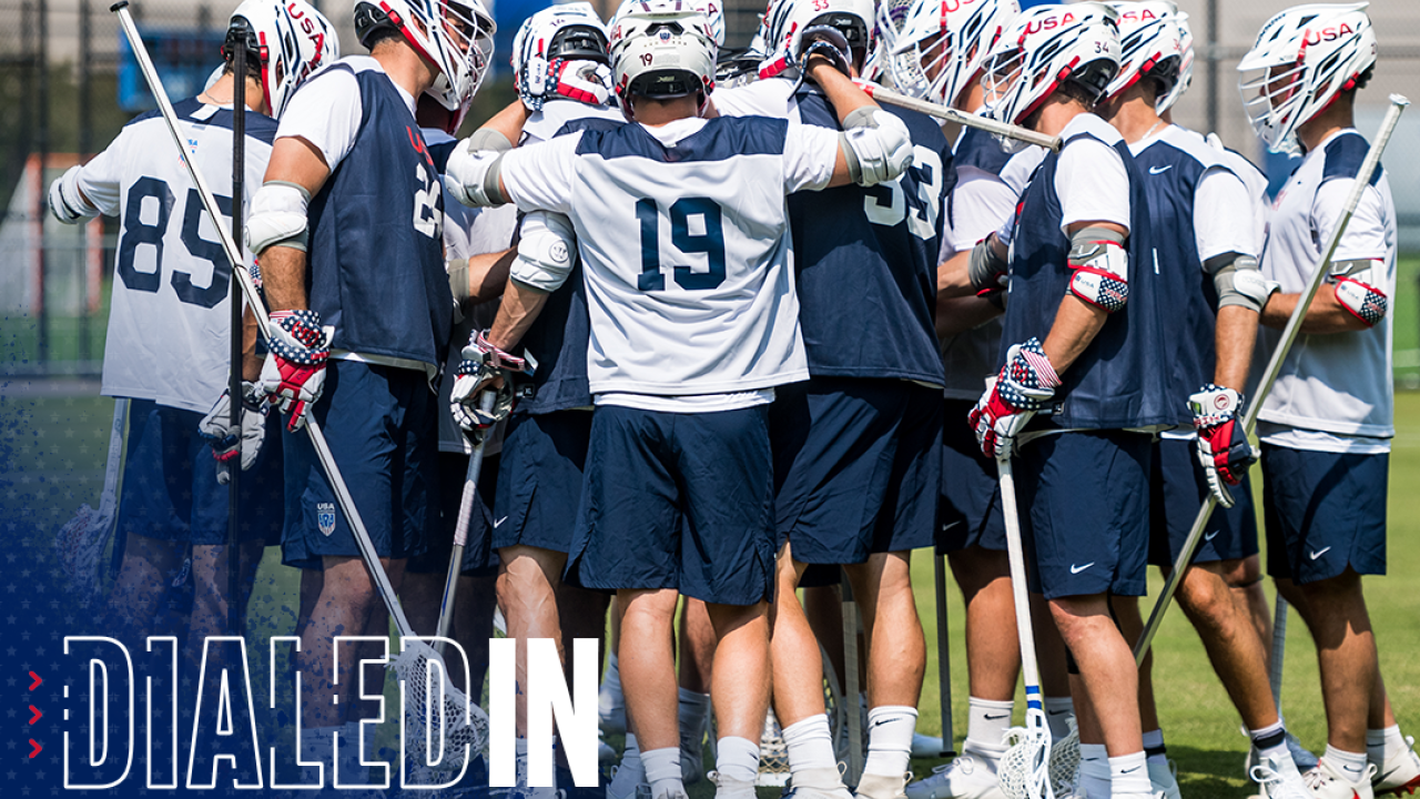 The U.S. men's team huddles together.