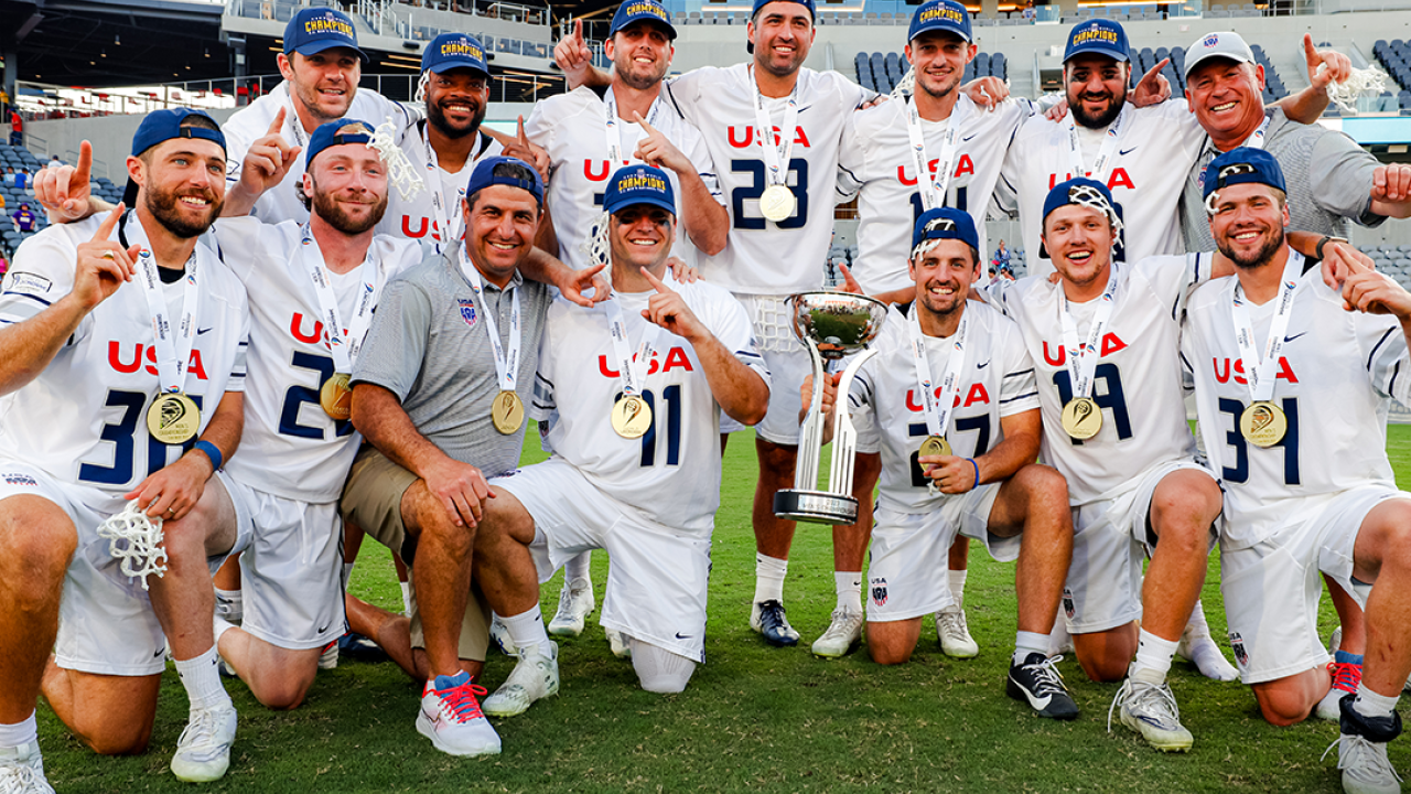 The 10 defenseman and two goalies of the gold medal-winning U.S. defense, along with coaches Joe Amplo and Charley Toomey.