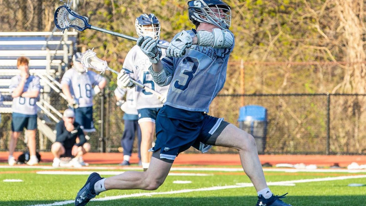 Staples (Conn.) boys' lacrosse player Ben Burmeister in action