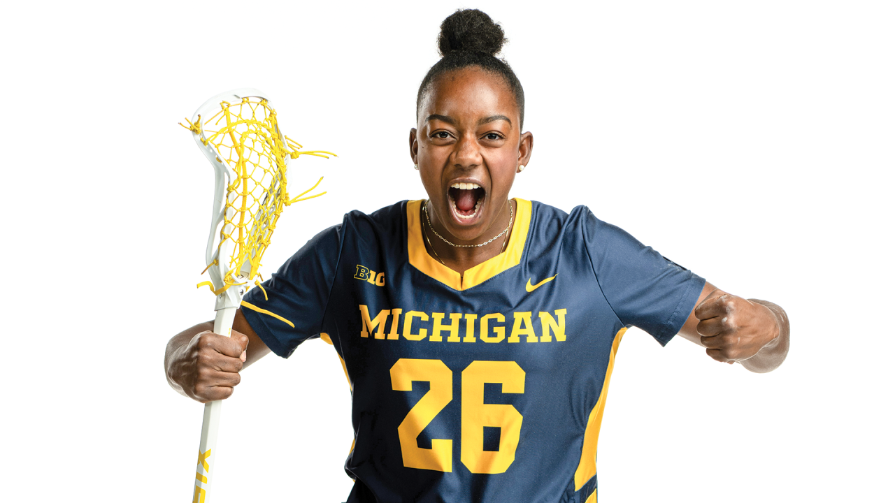 Studio portrait of Michigan women's lacrosse player Jordyn Harrison roaring