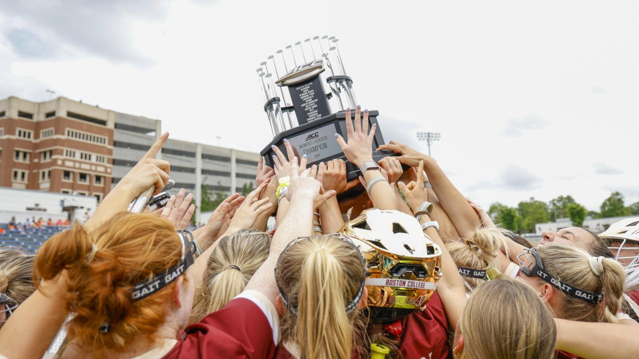 Boston College hoists the ACC women's lacrosse championship trophy for the second straight year.