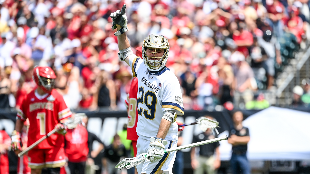 Notre Dame midfielder Devon McLane points upward after scoring a goal in an NCAA semifinal win over Denver at Lincoln Financial Field in Philadelphia.