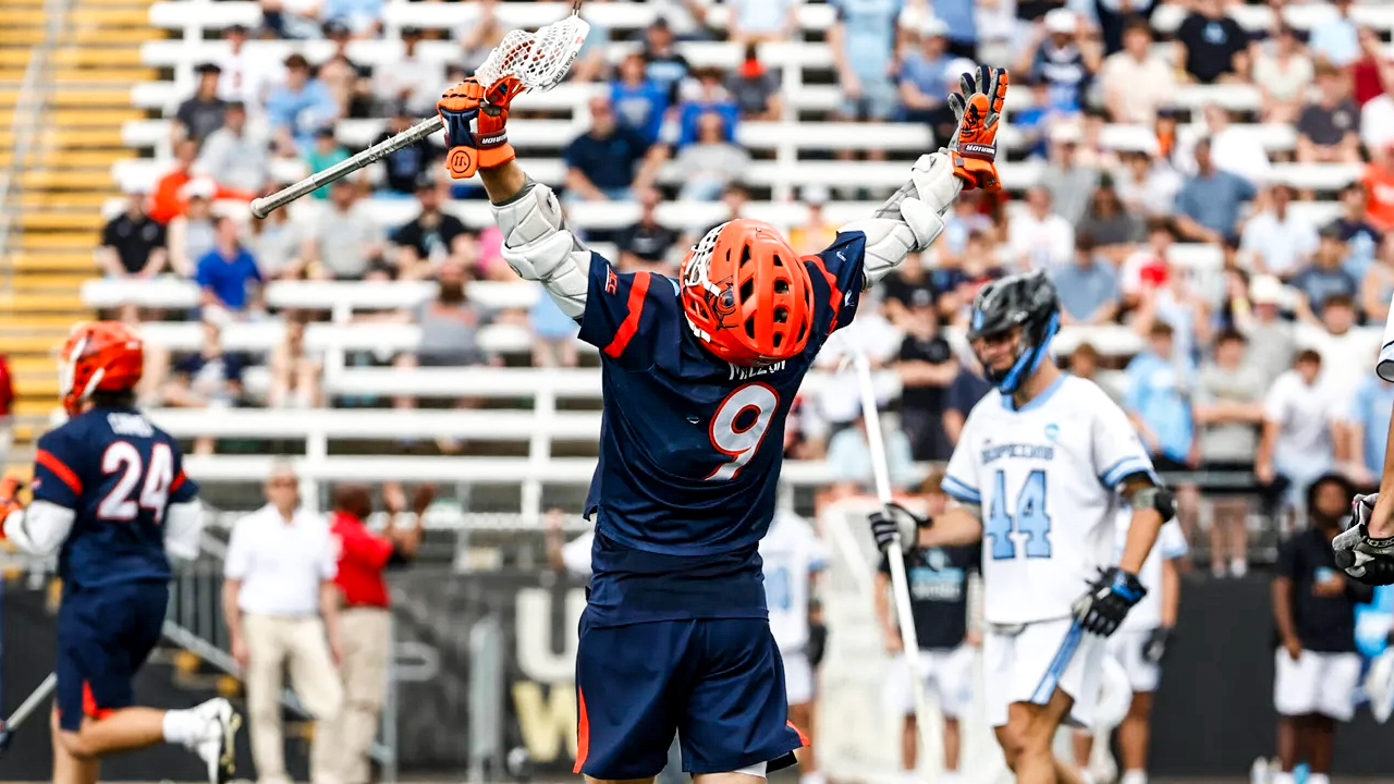 Virginia freshman McCabe Millon celebrates after scoring a goal in the Cavaliers' NCAA quarterfinal win over Johns Hopkins at Towson.