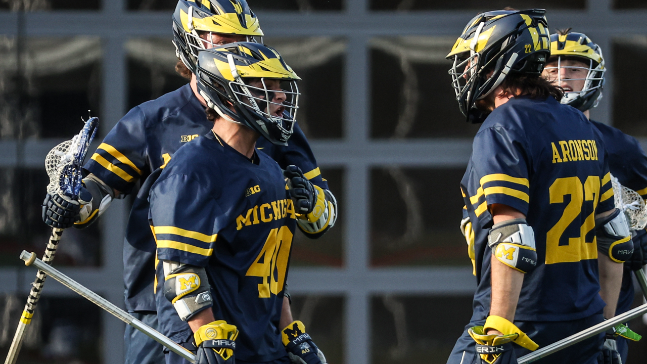 Michigan's Ryan Cohen (40) celebrates a goal with his teammates