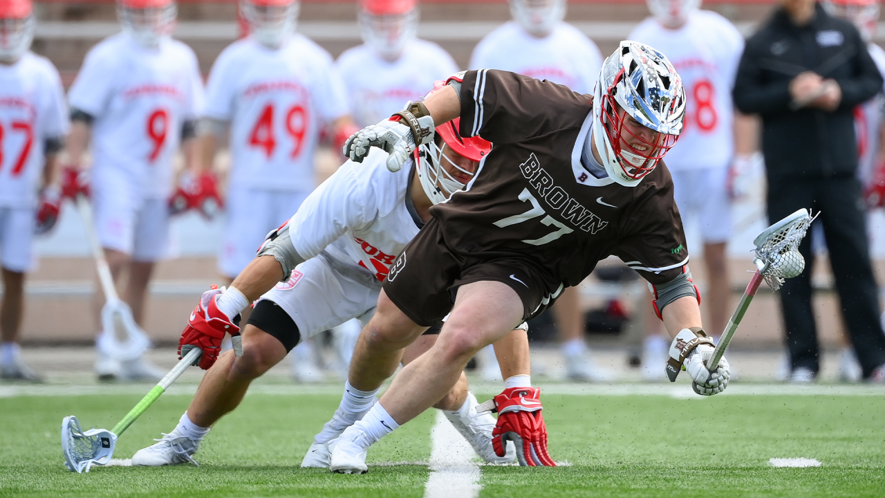 Dash Sachs wins a faceoff against Cornell during the 2024 season.