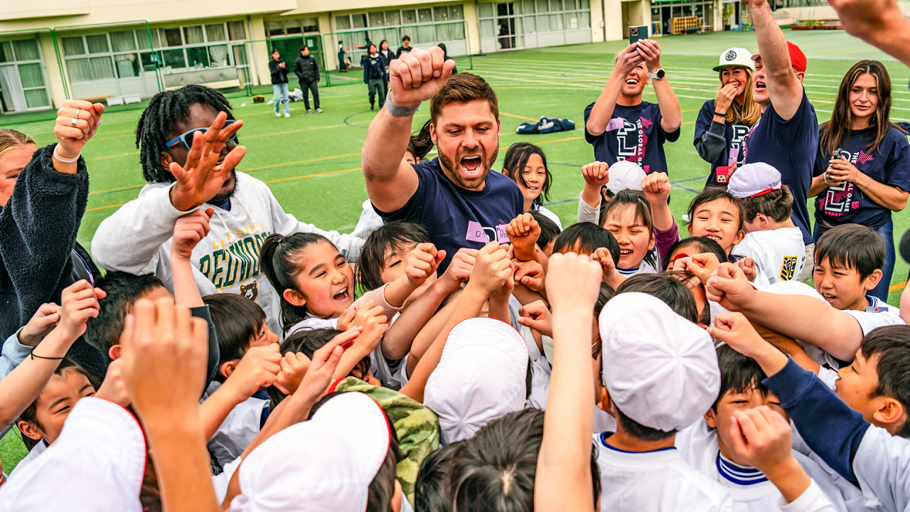 Rob Pannell breaks down the huddle during a clinic with Japanese schoolchildren, part of the PLL tour in March.