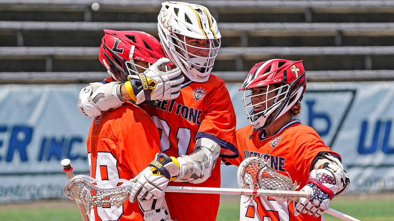 Team 91 Long Island Storm 2026 players celebrate after a goal during the NLF 2026 AA national championship game at Stony Brook.