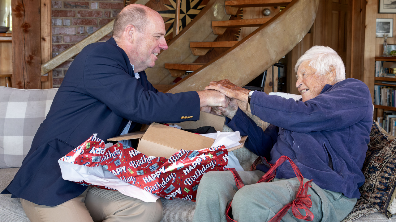 RPI president Martin Schmidt visits alum Bill Coleman to celebrate Coleman's 100th birthday and the university's bicentennial.