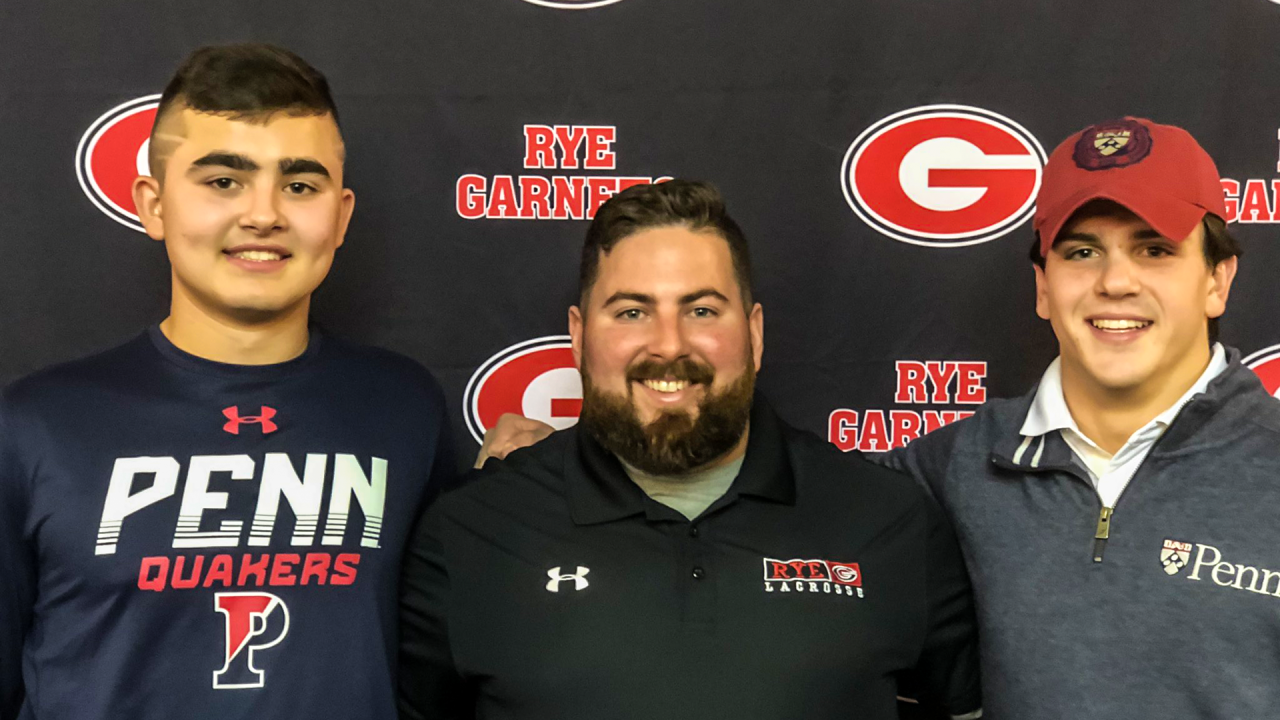 Emmet Carroll (left) and Brendan Lavelle with Rye (N.Y.) coach Steve Lennon after signing their national letters of intent to play together at Penn.