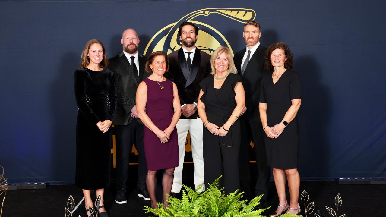 HOF Class of 2024, left to right: Kristen Kjellman Marshall, John Grant, Jr., Betsy Meng Ramsey, Paul Rabil, Carol Daly Cantele, Brodie Merrill, and Patti Klecha-Porter. Not pictured: Vin LoBello (inducted posthumously)